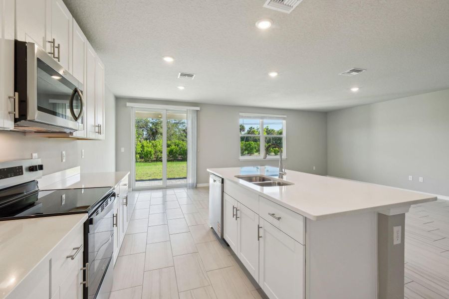 Spacious, unfurnished interior of a new home in Hampton Park - Classic Series, Vero Beach (Image 26).