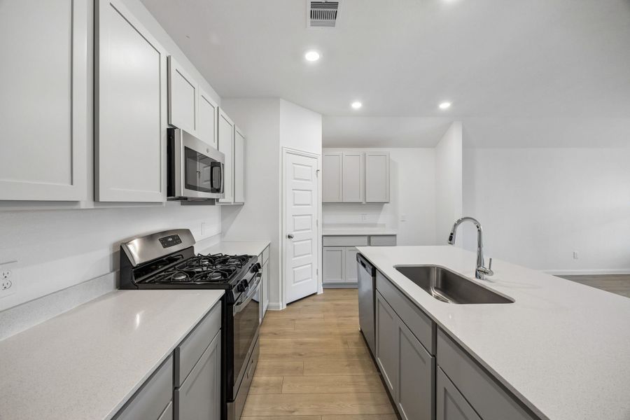 Furnished interior view inside a new home in Meridiana, Manvel (Image 7).