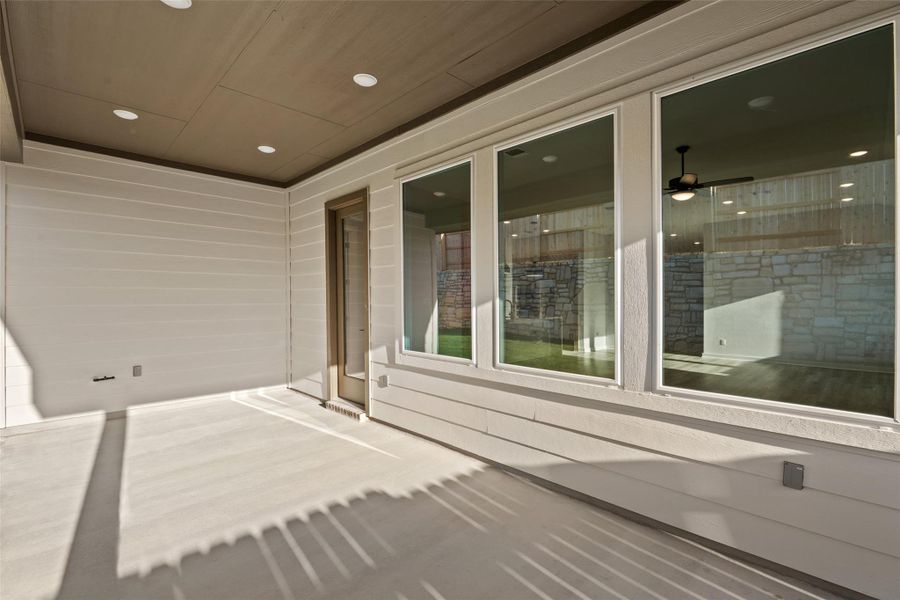 Exterior details and patio area of a home in Lariat, Liberty Hill (Image 22).