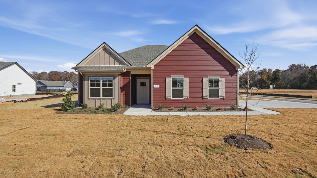 Front exterior of a new home in Stillwater, Tullahoma, TN, highlighting curb appeal (Image 2). Front exterior of a new home in Stillwater, Tullahoma, TN, highlighting curb appeal (Image 2).
