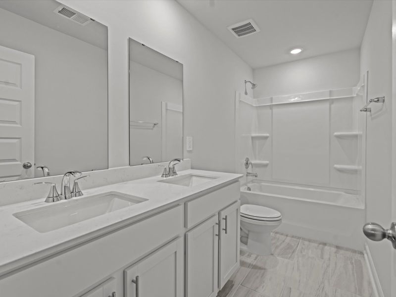 Furnished interior view inside a new home in The Farm at Wells Creek - Heritage Collection, Gray Court (Image 6). Furnished interior view inside a new home in The Farm at Wells Creek - Heritage Collection, Gray Court (Image 6).