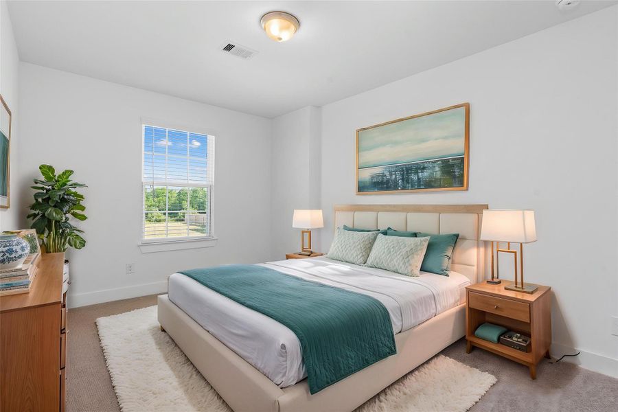 Virtually staged to reflect comfort and style, this spacious upstairs guest suite includes a walk-in closet and abundant natural light. A perfect space for guests, teens, or even a cozy second office setup. Virtually staged to reflect comfort and style, this spacious upstairs guest suite includes a walk-in closet and abundant natural light. A perfect space for guests, teens, or even a cozy second office setup.