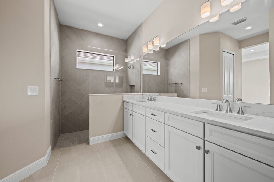 Furnished interior view inside a new home in SkySail, Naples (Image 8).