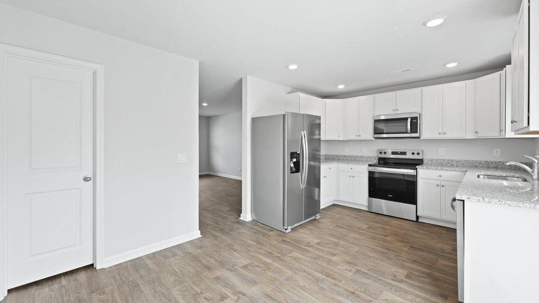 Furnished interior view inside a new home in Center Pointe, Santee (Image 6).