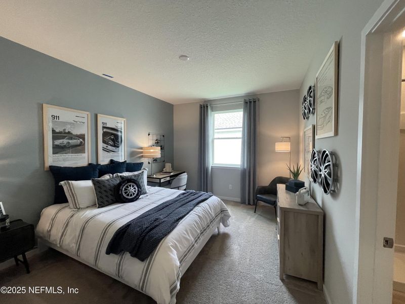 Furnished interior view inside a new home in The Magnolia Series at Reserve East, Flagler Beach (Image 17). Furnished interior view inside a new home in The Magnolia Series at Reserve East, Flagler Beach (Image 17).