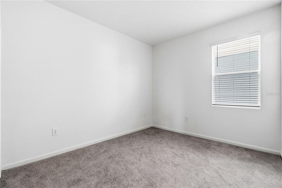 Spacious, unfurnished interior of a new home in Wellness Ridge, Clermont (Image 23).