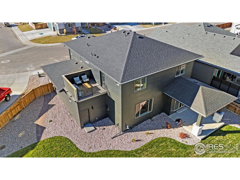 Exterior details and patio area of a home in Greenspire At Windsor Lake, Windsor (Image 26).