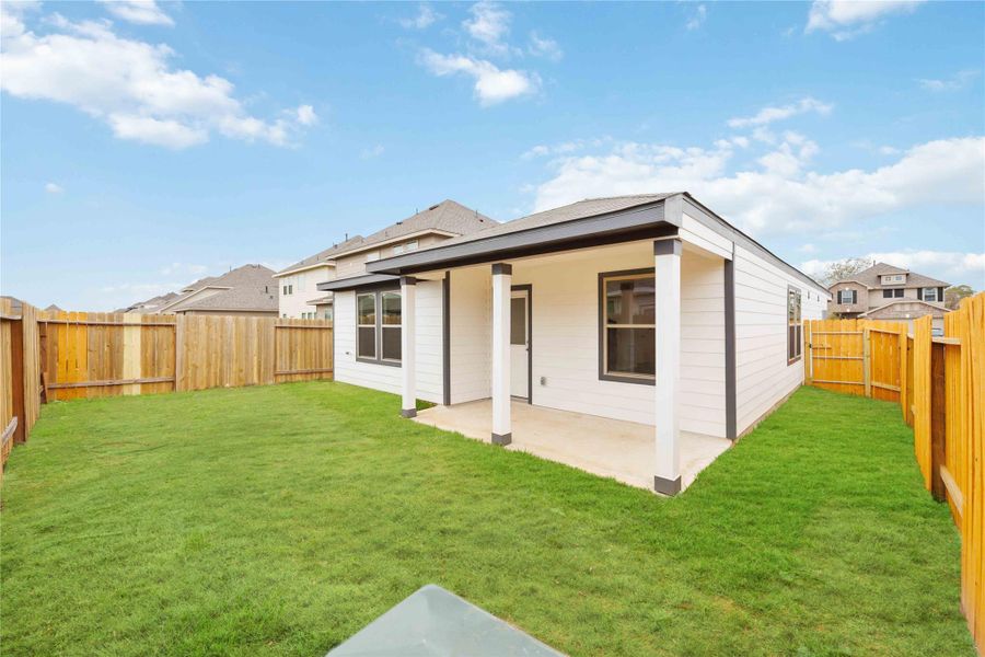 Front exterior of a new home in Sandrock Station, Houston, TX, highlighting curb appeal (Image 2).