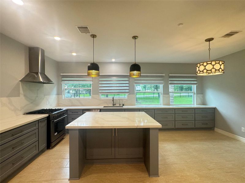 Stainless steel appliances, Quartz countertops, and tons of cabinet space