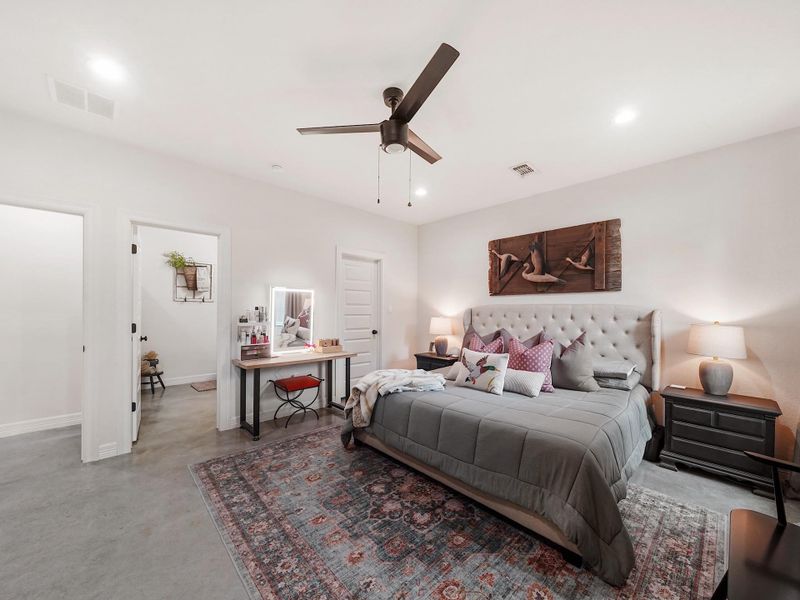 ANOTHER VIEW OF THE PRIMARY BEDROOM