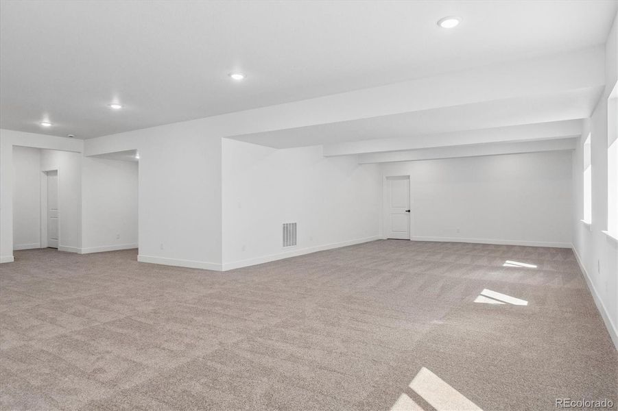 Spacious, unfurnished interior of a new home in Peakview at Ascent Village, Littleton (Image 30).
