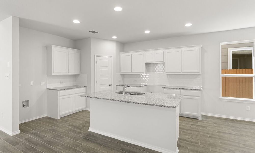 Representative exterior photo of a completed home built from the Thorndale by Impression Homes in Heartland, Heartland, TX (Image 8). Representative exterior photo of a completed home built from the Thorndale by Impression Homes in Heartland, Heartland, TX (Image 8).