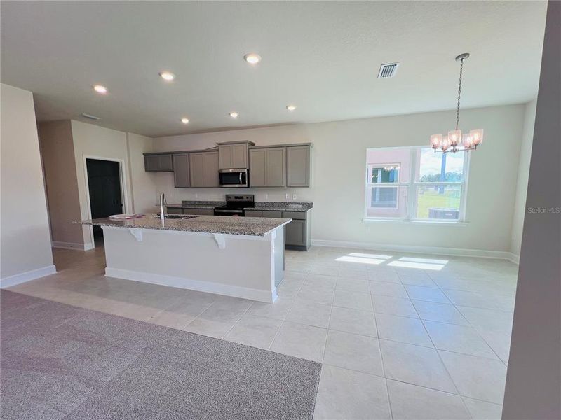Furnished interior view inside a new home in Harmony Central, St. Cloud (Image 5).