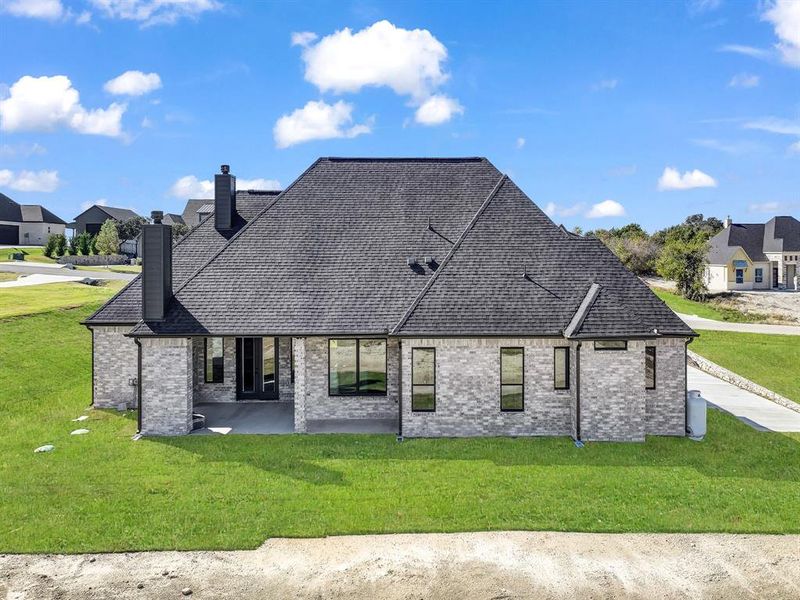 Exterior details and patio area of a home in , Weatherford (Image 29).
