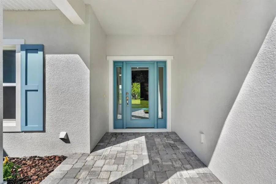 Exterior details and patio area of a home in , New Smyrna Beach (Image 24).