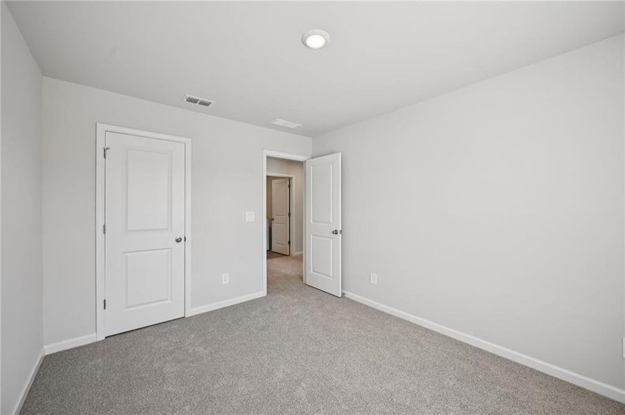Spacious, unfurnished interior of a new home in Creekside at Oxford Park, Fairburn (Image 30).