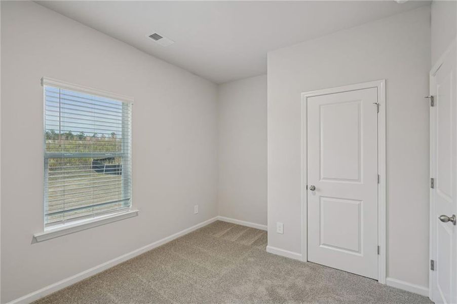 Spacious, unfurnished interior of a new home in Avalon - Reserve Series, Conyers (Image 23). Spacious, unfurnished interior of a new home in Avalon - Reserve Series, Conyers (Image 23).