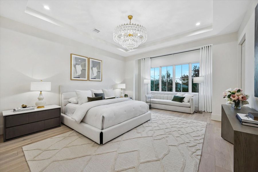 [Primary Suite] Set apart from the rest of the bedrooms with a sitting area, and adjacent office nook.