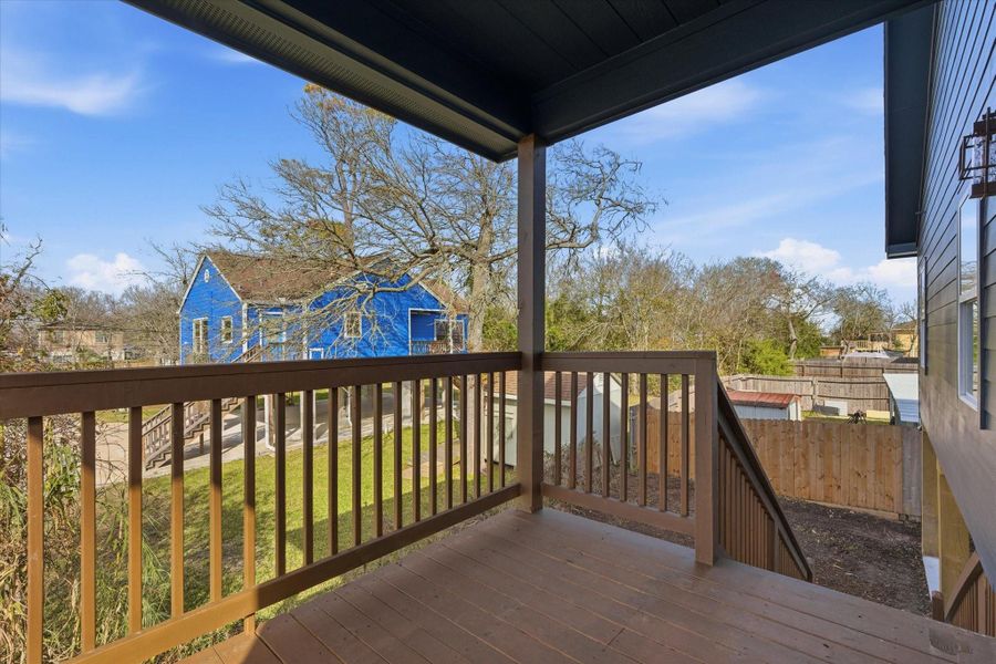 Off the kitchen, an expansive back patio offers the perfect setting to unwind and enjoy the evening breeze after a long day.