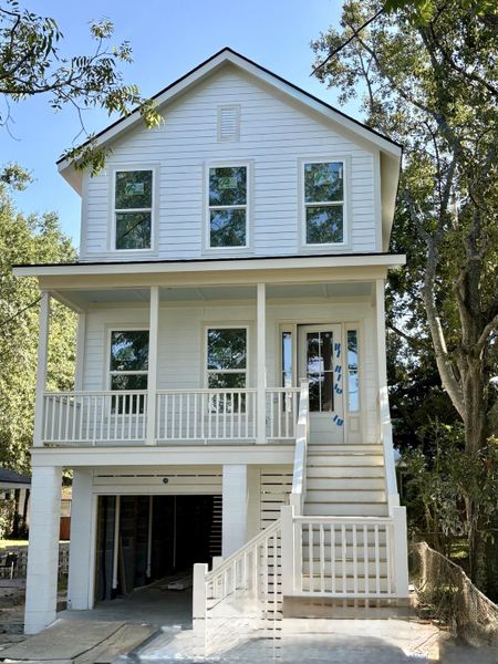 Front exterior of a new home in , North Charleston, SC, highlighting curb appeal (Image 1). Front exterior of a new home in , North Charleston, SC, highlighting curb appeal (Image 1).