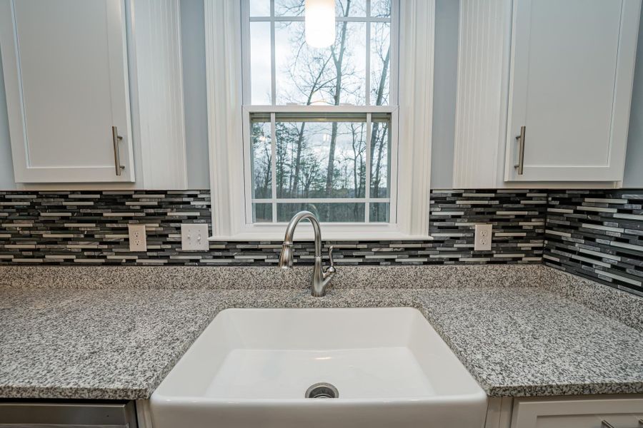 Representative furnished interior of a home built from the Roosevelt Elite by Enchanted Homes in Pointe Summit, Slater-Marietta (Image 11).