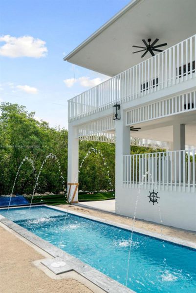 Front exterior of a new home in , Key Largo, FL, highlighting curb appeal (Image 19). Front exterior of a new home in , Key Largo, FL, highlighting curb appeal (Image 19).