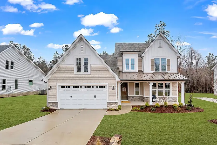 Representative exterior photo of a completed home built from the The Chandler by RobuckHomes in Baylee Ridge, Selma, NC (Image 34). Representative exterior photo of a completed home built from the The Chandler by RobuckHomes in Baylee Ridge, Selma, NC (Image 34).