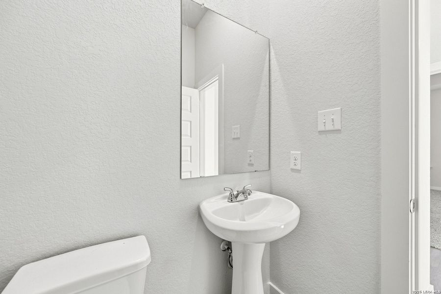 Furnished interior view inside a new home in Red Hawk Landing, San Antonio (Image 8).