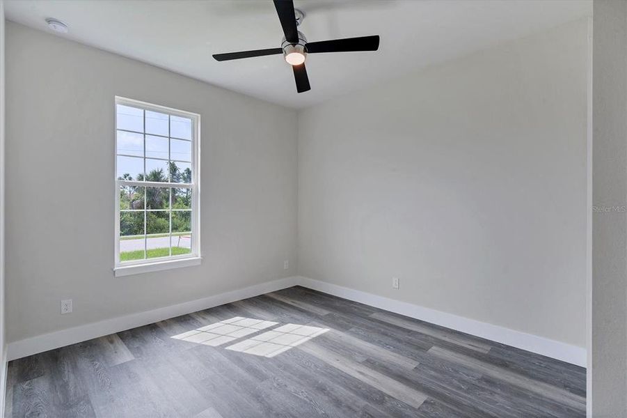 Spacious, unfurnished interior of a new home in , Port Charlotte (Image 21).