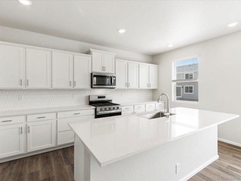 Furnished interior view inside a new home in Poudre Heights: The Alpine Collection, Windsor (Image 9).