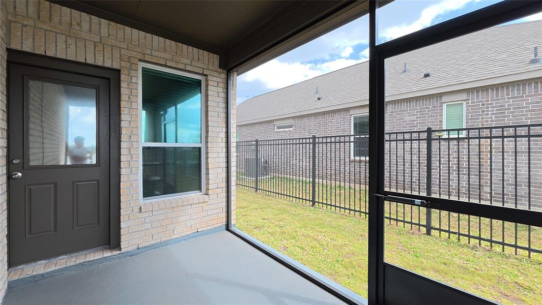 Exterior details and patio area of a home in Sunterra, Katy (Image 14).