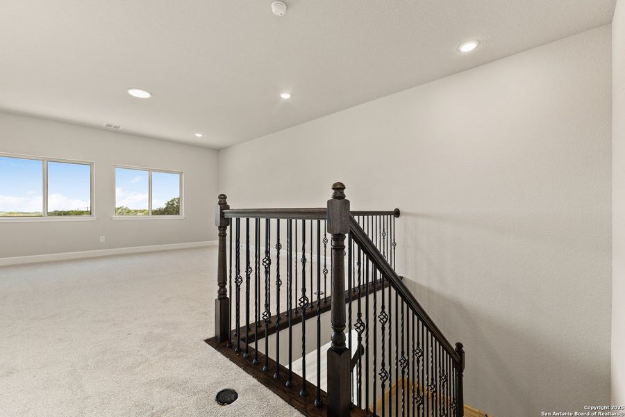 Spacious, unfurnished interior of a new home in The Enclave at Potranco Oaks, Castroville (Image 19).