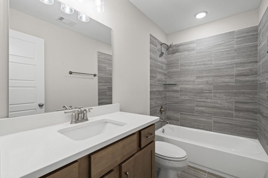 Full bath with tub / shower combination and vanity
