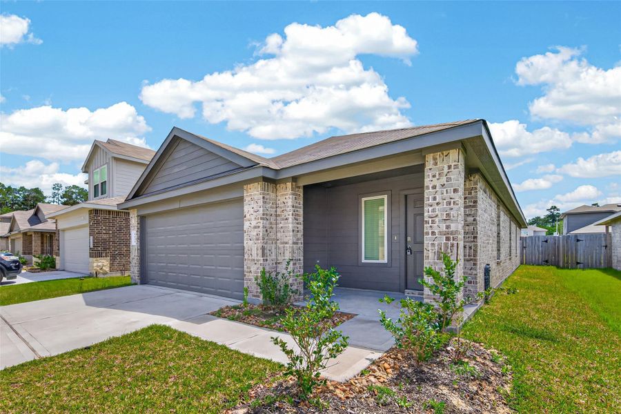 Front exterior of a new home in Breckenridge Forest, Spring, TX, highlighting curb appeal (Image 24).