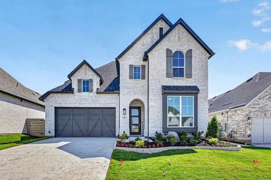 Front exterior of a new home in Landmark, Denton, TX, highlighting curb appeal (Image 1). Front exterior of a new home in Landmark, Denton, TX, highlighting curb appeal (Image 1).