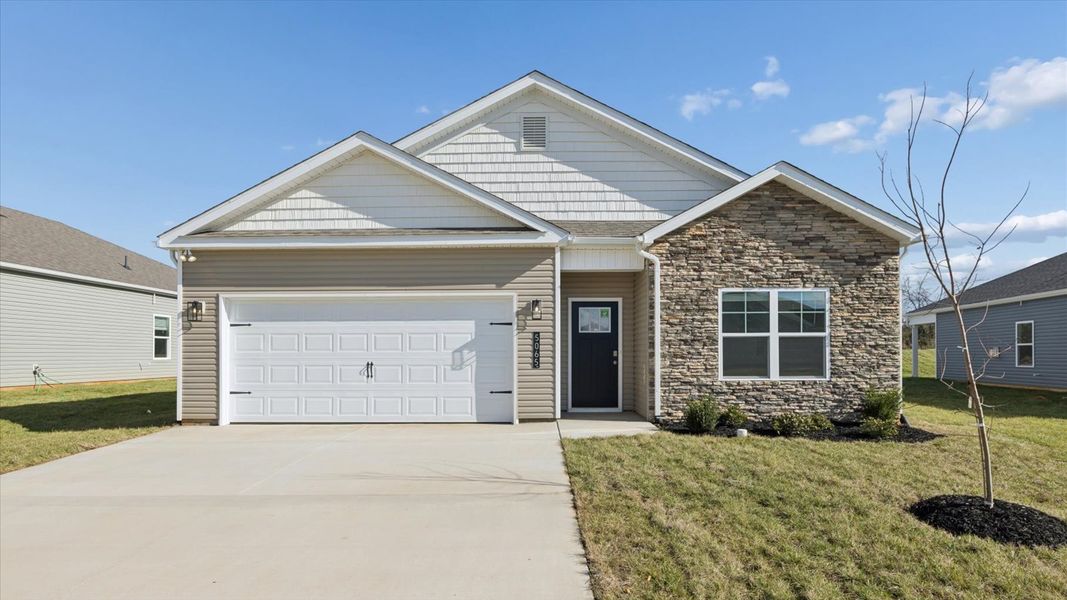 Front exterior of a new home in Millstone Village, Morristown, TN, highlighting curb appeal (Image 1). Front exterior of a new home in Millstone Village, Morristown, TN, highlighting curb appeal (Image 1).