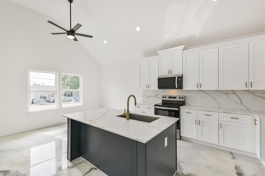 Furnished interior view inside a new home in Bridgeland, Cypress (Image 5).