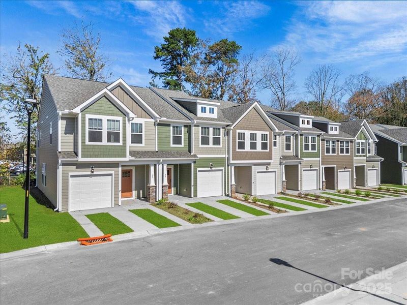 Front exterior of a new home in Clayton Crossing, Arden, NC, highlighting curb appeal (Image 1). Front exterior of a new home in Clayton Crossing, Arden, NC, highlighting curb appeal (Image 1).