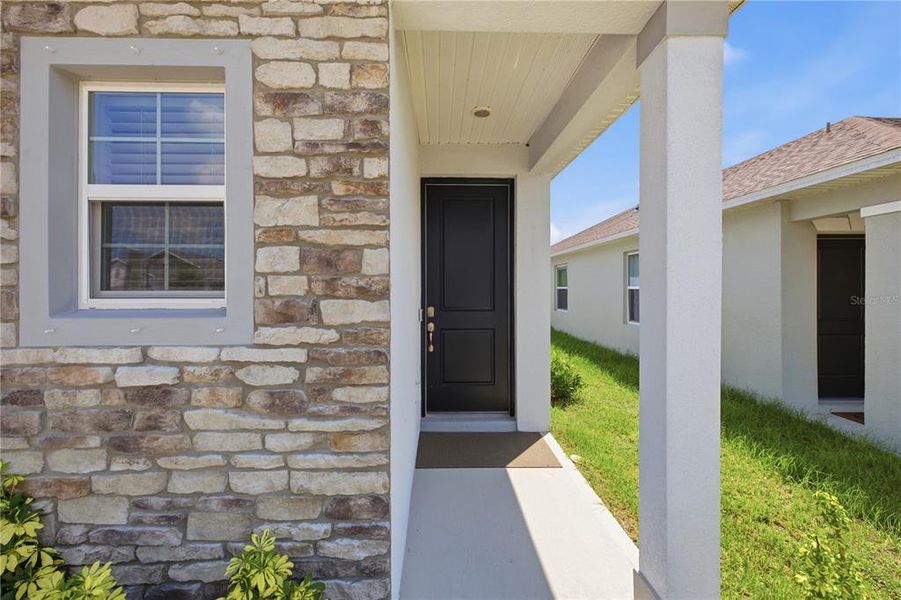 Exterior details and patio area of a home in , Harmony (Image 3). Exterior details and patio area of a home in , Harmony (Image 3).