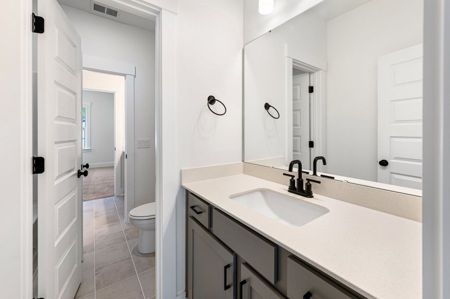 Representative furnished interior of a home built from the St. Ledger by Hunter Quinn Homes in Creek Pointe, Moncks Corner (Image 12).