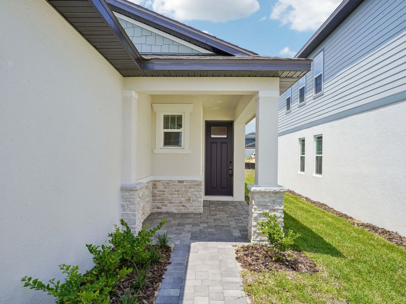Exterior details and patio area of a home in Cyrene at Minneola, Minneola (Image 2). Exterior details and patio area of a home in Cyrene at Minneola, Minneola (Image 2).