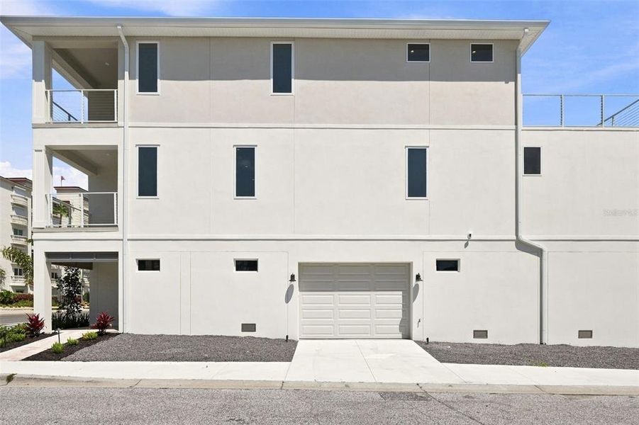 Front exterior of a new home in , Indian Rocks Beach, FL, highlighting curb appeal (Image 1). Front exterior of a new home in , Indian Rocks Beach, FL, highlighting curb appeal (Image 1).