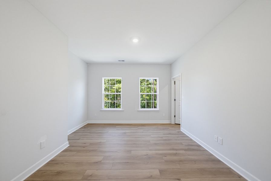 Spacious, unfurnished interior of a new home in Sweetbrier, Durham (Image 28).