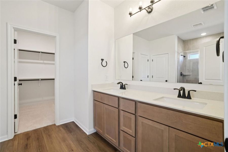 Furnished interior view inside a new home in Village at Three Oaks, Seguin (Image 11).