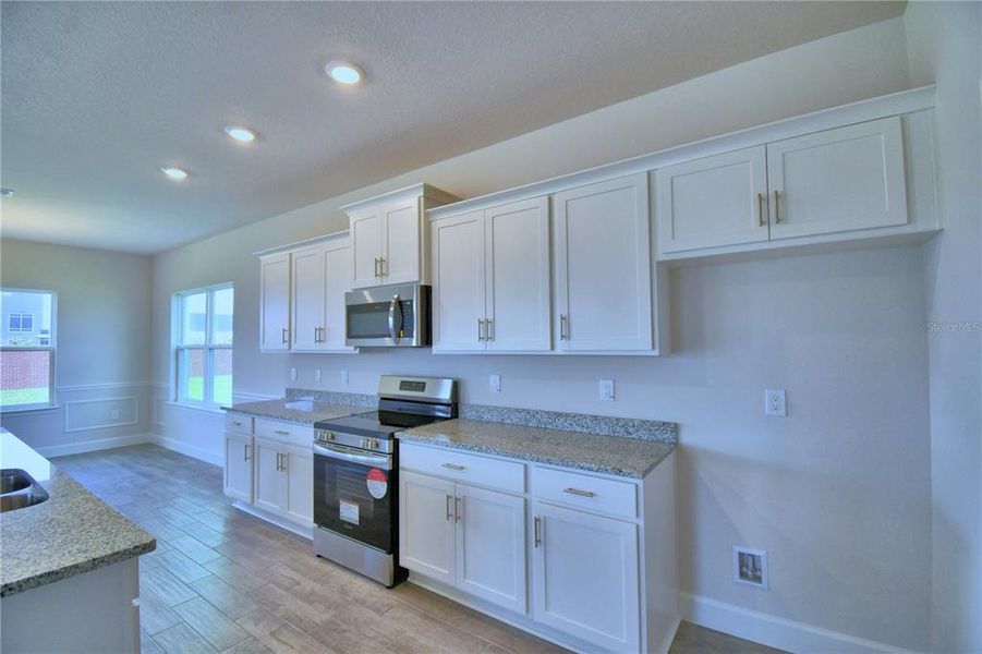 Furnished interior view inside a new home in Lake Juliana Estates, Auburndale (Image 7).