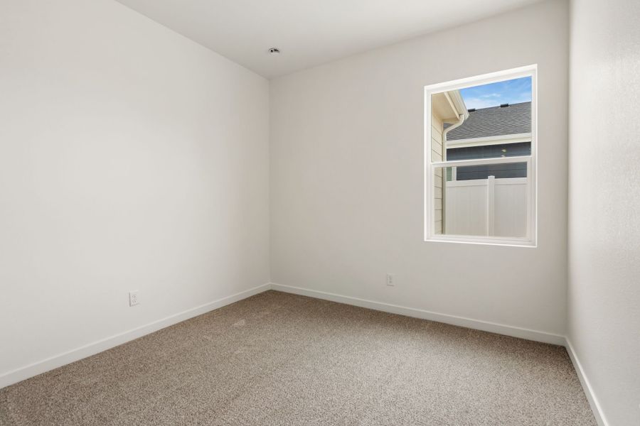 Spacious, unfurnished interior of a new home in Union Colony West, Greeley (Image 15).
