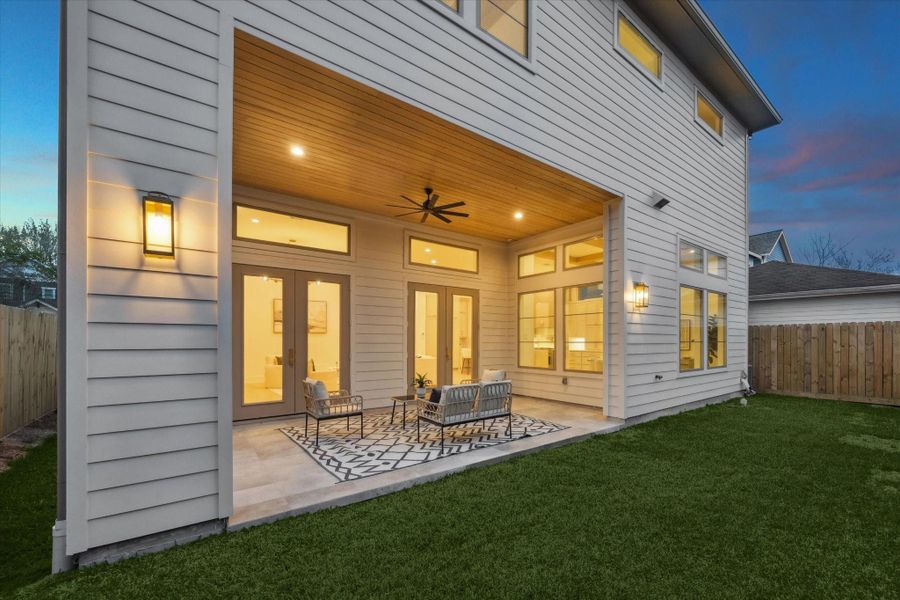 The fully fenced, low-maintenance yard provides a wonderful space for loved ones to run, play, and enjoy the outdoors.
