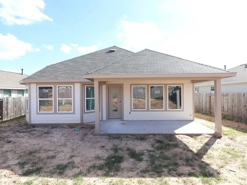 Exterior details and patio area of a home in Magnolia Ridge, Magnolia (Image 4).