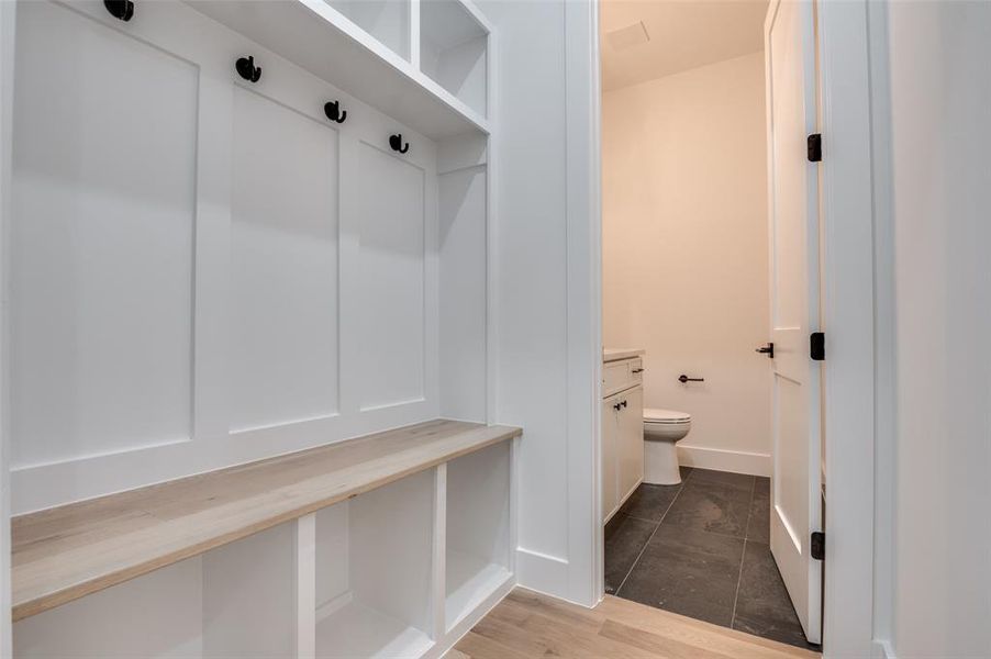 Mudroom featuring wood finished floors Mudroom featuring wood finished floors