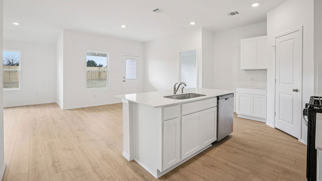 Furnished interior view inside a new home in Carillon, Manor (Image 4).